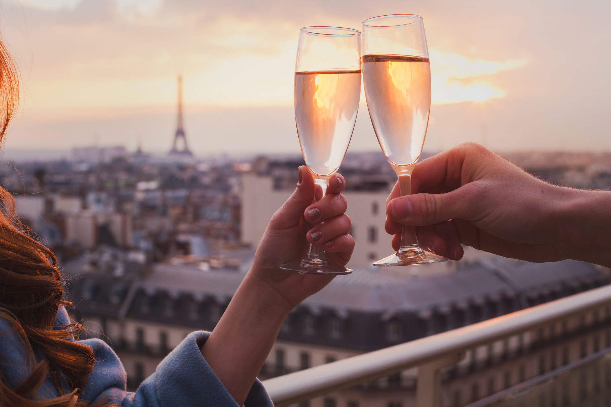 couple drinking champagne or wine in Paris luxurious restaurant, France